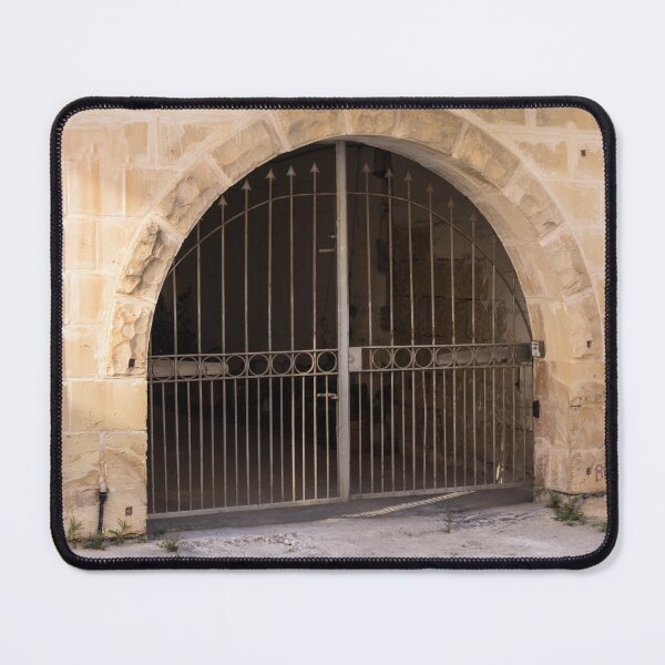 Item preview, Wrought Iron Gate and Stone Arch Entrance of Historic Limestone Building With Arched Doorway designed and sold by Nmallia.