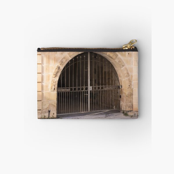 Item preview, Wrought Iron Gate and Stone Arch Entrance of Historic Limestone Building With Arched Doorway designed and sold by Nmallia.