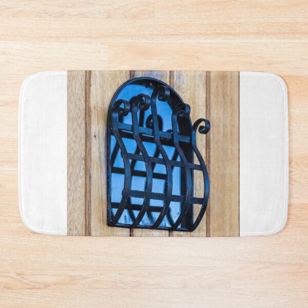Item preview, Decorative Wrought Iron Window Grille on Wooden Door With Blue Glass Reflection designed and sold by Nmallia.