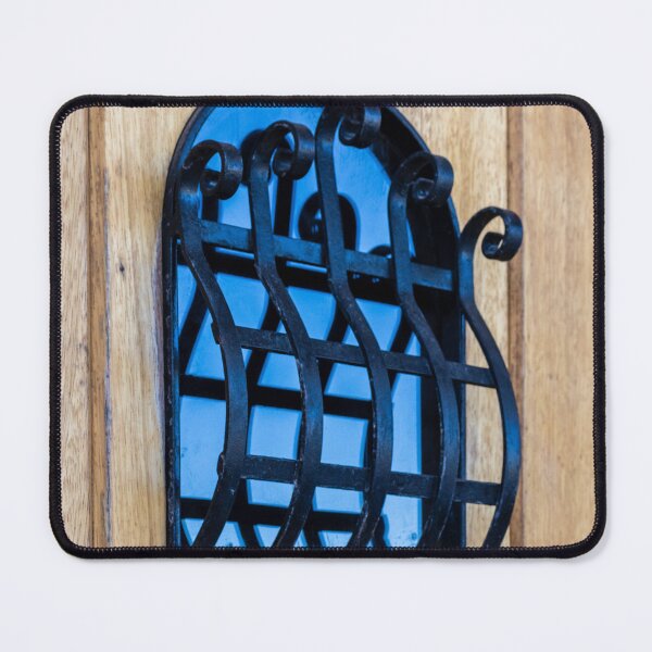 Item preview, Decorative Wrought Iron Window Grille on Wooden Door With Blue Glass Reflection designed and sold by Nmallia.
