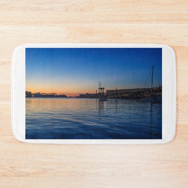 Item preview, Sunset Over Historic Harbor With Fortified Walls, Lighthouse and Calm Twilight Water designed and sold by Nmallia.