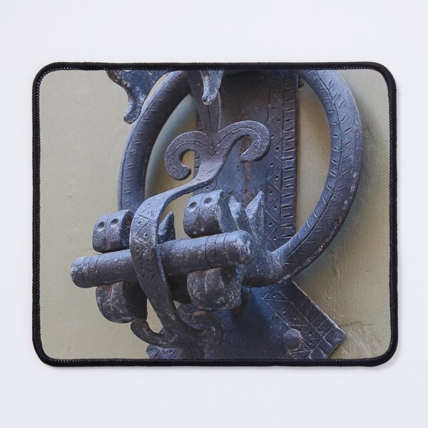 Item preview, Antique Iron Door Knocker Close-Up On Weathered Wooden Door With Decorative Hardware designed and sold by Nmallia.