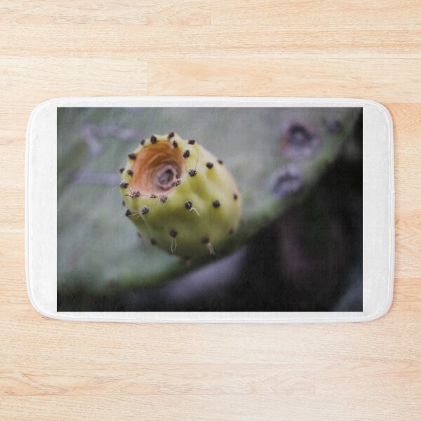 Item preview, Macro Close-Up Of Unripe Prickly Pear Cactus Fruit On Green Pad With Soft Background designed and sold by Nmallia.