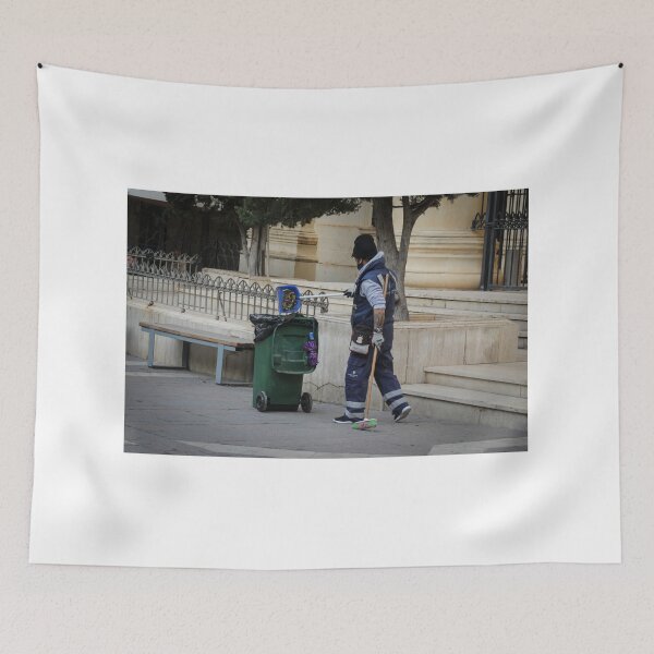 Item preview, Street Cleaner Wearing Uniform Sweeping Near Green Trash Bin by Public Steps and Bench designed and sold by Nmallia.