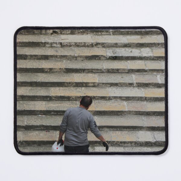 Item preview, Worker Man Carrying Plastic Jug Up Old Stone Steps Back View designed and sold by Nmallia.
