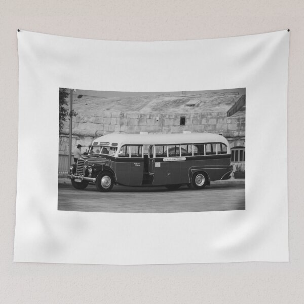 Item preview, Vintage Maltese Bus Parked By Historic Stone Wall in Valletta - Classic Retro Coach and Nostalgic Transport Scene designed and sold by Nmallia.