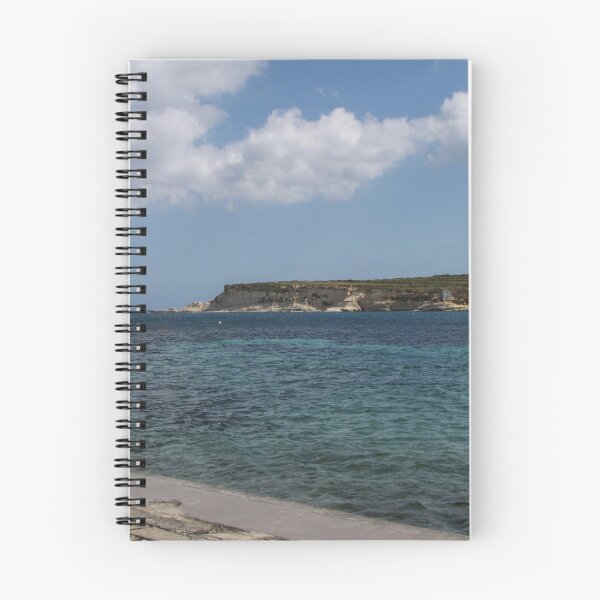Item preview, Turquoise Sea and Sandy Beach With Cloudy Sky Over a Quiet Coastal Promenade designed and sold by Nmallia.