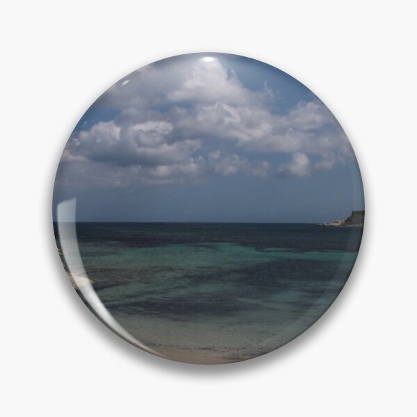 Item preview, Turquoise Sea and Sandy Beach With Cloudy Sky Over a Quiet Coastal Promenade designed and sold by Nmallia.