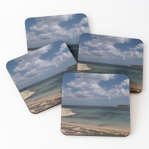 Item preview, Turquoise Sea and Sandy Beach With Cloudy Sky Over a Quiet Coastal Promenade designed and sold by Nmallia.