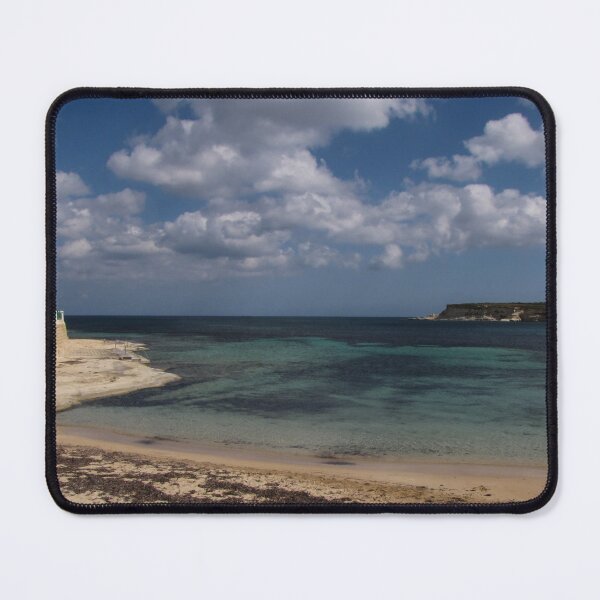 Item preview, Turquoise Sea and Sandy Beach With Cloudy Sky Over a Quiet Coastal Promenade designed and sold by Nmallia.