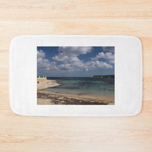 Item preview, Turquoise Sea and Sandy Beach With Cloudy Sky Over a Quiet Coastal Promenade designed and sold by Nmallia.
