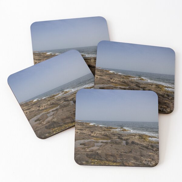 Item preview, Crashing Ocean Waves Over Rocky Shoreline With White Foam Splash And Textured Rocks designed and sold by Nmallia.