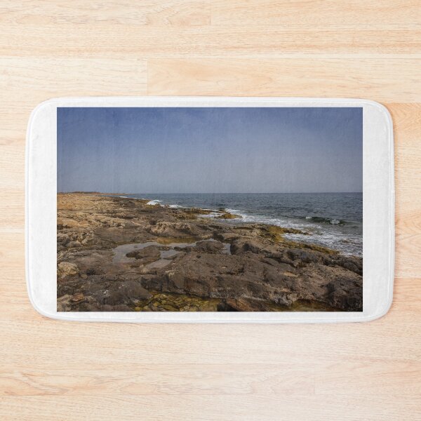 Item preview, Crashing Ocean Waves Over Rocky Shoreline With White Foam Splash And Textured Rocks designed and sold by Nmallia.