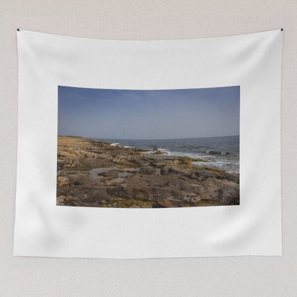 Item preview, Crashing Ocean Waves Over Rocky Shoreline With White Foam Splash And Textured Rocks designed and sold by Nmallia.