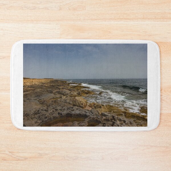 Item preview, Crashing Ocean Waves Over Rocky Shoreline With White Foam Splash And Textured Rocks designed and sold by Nmallia.