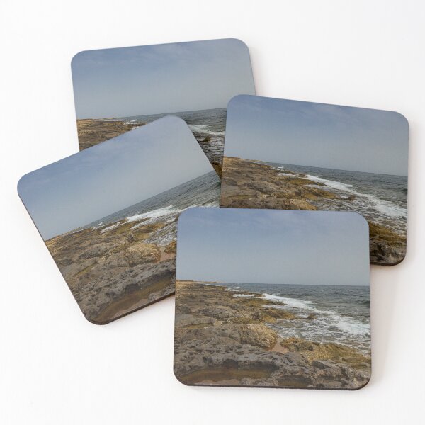 Item preview, Crashing Ocean Waves Over Rocky Shoreline With White Foam Splash And Textured Rocks designed and sold by Nmallia.