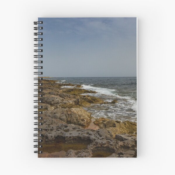 Item preview, Crashing Ocean Waves Over Rocky Shoreline With White Foam Splash And Textured Rocks designed and sold by Nmallia.