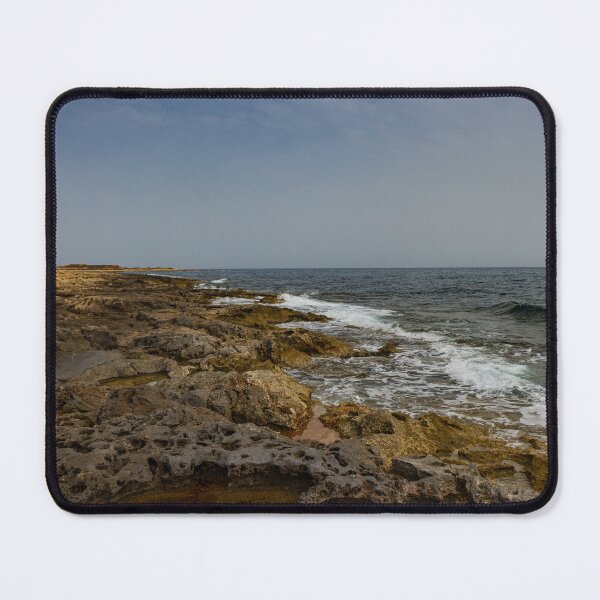 Item preview, Crashing Ocean Waves Over Rocky Shoreline With White Foam Splash And Textured Rocks designed and sold by Nmallia.