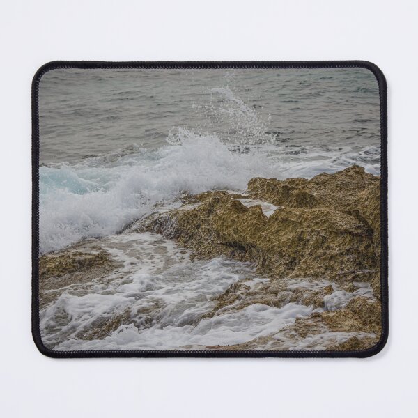 Item preview, Crashing Ocean Waves Over Rocky Shoreline With White Foam Splash And Textured Rocks designed and sold by Nmallia.