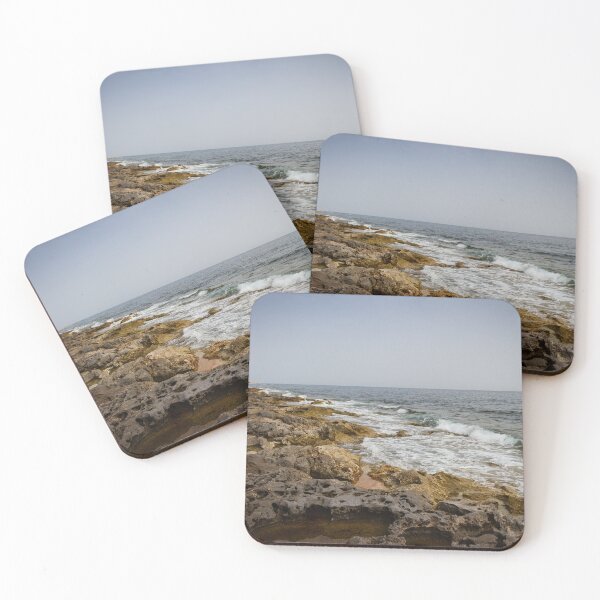 Item preview, Crashing Ocean Waves Over Rocky Shoreline With White Foam Splash And Textured Rocks designed and sold by Nmallia.