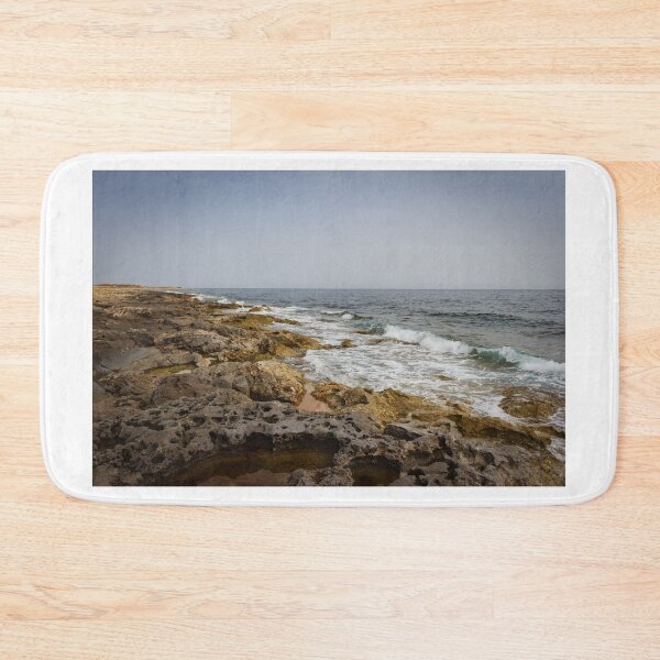 Item preview, Crashing Ocean Waves Over Rocky Shoreline With White Foam Splash And Textured Rocks designed and sold by Nmallia.