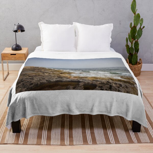Item preview, Crashing Ocean Waves Over Rocky Shoreline With White Foam Splash And Textured Rocks designed and sold by Nmallia.