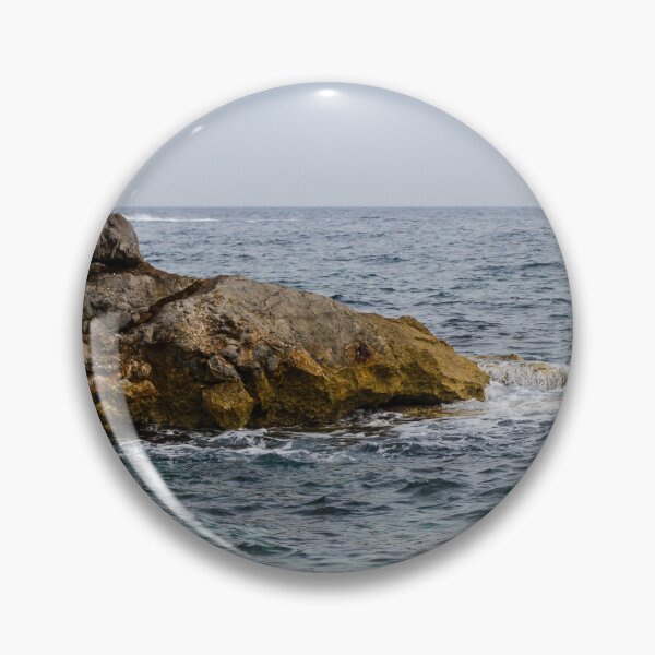 Item preview, Crashing Ocean Waves Over Rocky Shoreline With White Foam Splash And Textured Rocks designed and sold by Nmallia.