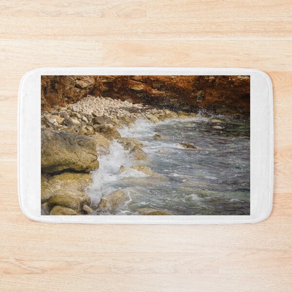 Item preview, Crashing Ocean Waves Over Rocky Shoreline With White Foam Splash And Textured Rocks designed and sold by Nmallia.