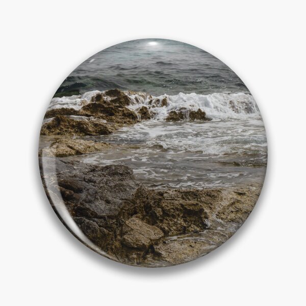 Item preview, Crashing Ocean Waves Over Rocky Shoreline With White Foam Splash And Textured Rocks designed and sold by Nmallia.