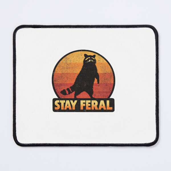 Item preview, Stay Feral Raccoon Sticker | Funny Retro Animal Meme designed and sold by HaveAGoodDay365.
