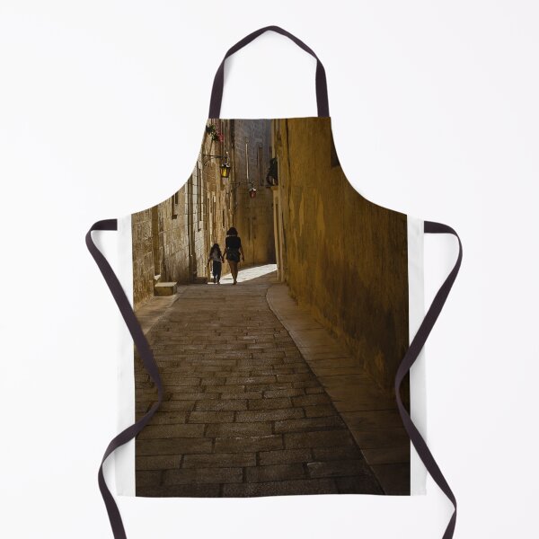 Item preview, Mother And Daughter Walking Hand In Hand Through Narrow Cobblestone Alley In Historic Old Town designed and sold by Nmallia.