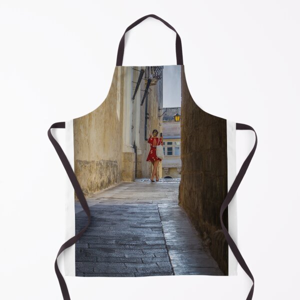 Item preview, Woman in Red Dress Walking Through Narrow Historic Alley Taking Photo of Old Town Architecture designed and sold by Nmallia.