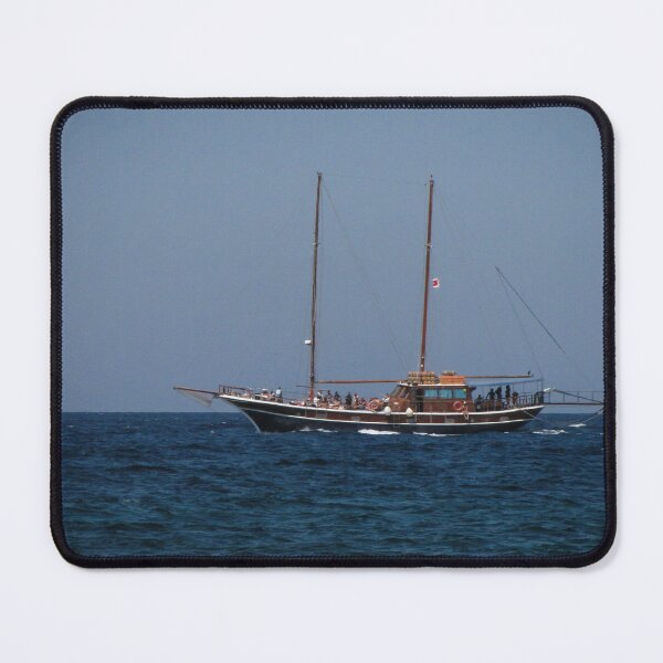 Item preview, Wooden Two-Masted Yacht Sailing On Calm Blue Sea With Passengers Under Clear Sky designed and sold by Nmallia.