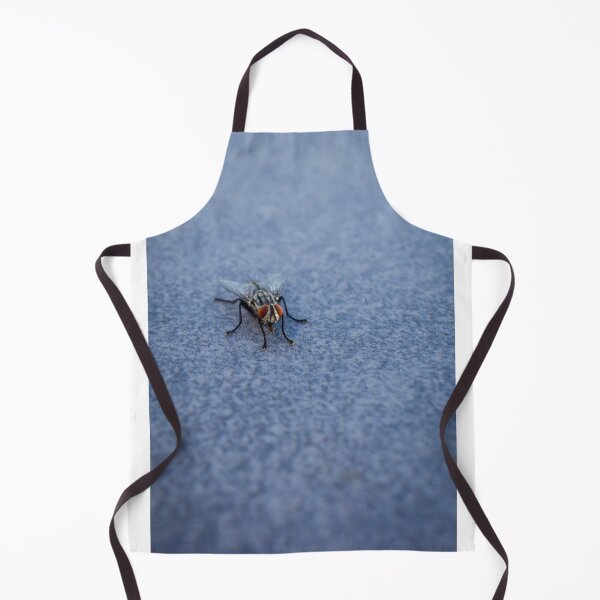 Item preview, Macro Close-Up Of A Housefly With Red Eyes On A Blue Textured Surface designed and sold by Nmallia.