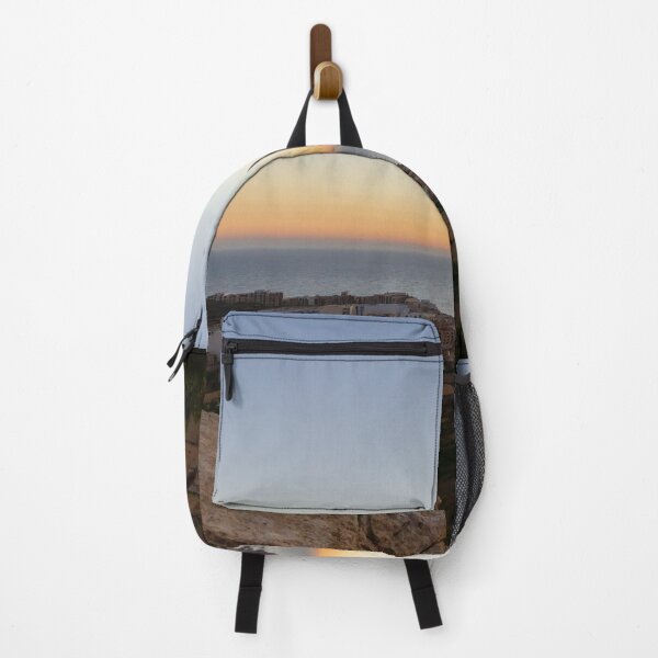 Item preview, Sunset Over Coastal Village and Rolling Hills With Sea Horizon and Warm Evening Light designed and sold by Nmallia.