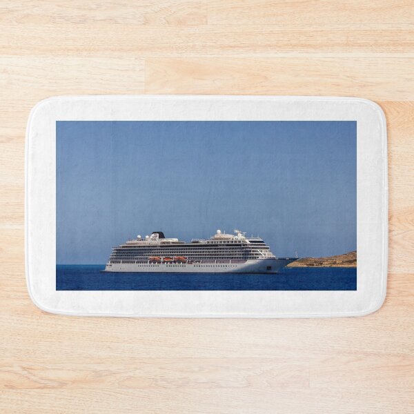 Item preview, Luxury Cruise Ship Sailing On Calm Blue Sea Near Rocky Coastline Under Clear Sky designed and sold by Nmallia.