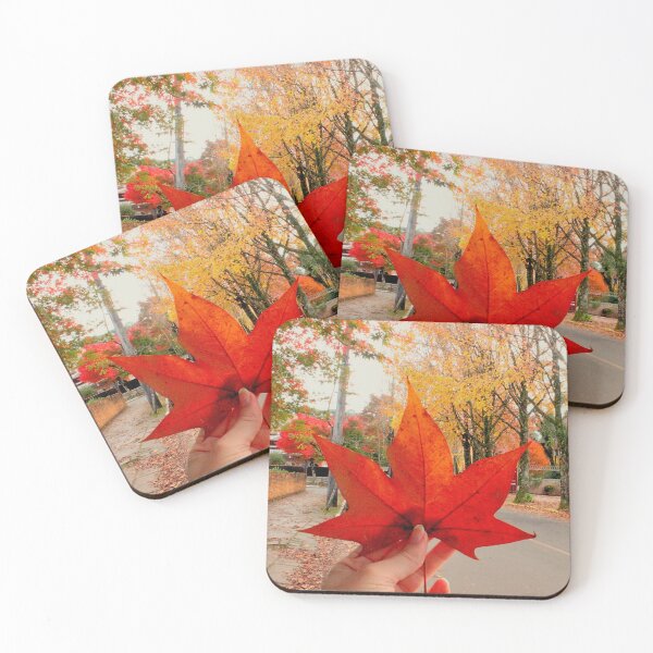 Item preview, Autumn Magic: Holding a Red Maple Leaf. Vibrant Red Autumn Maple Leaf in Hand designed and sold by TaynaraVieira.