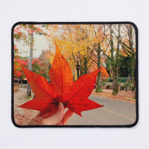 Item preview, Autumn Magic: Holding a Red Maple Leaf. Vibrant Red Autumn Maple Leaf in Hand designed and sold by TaynaraVieira.
