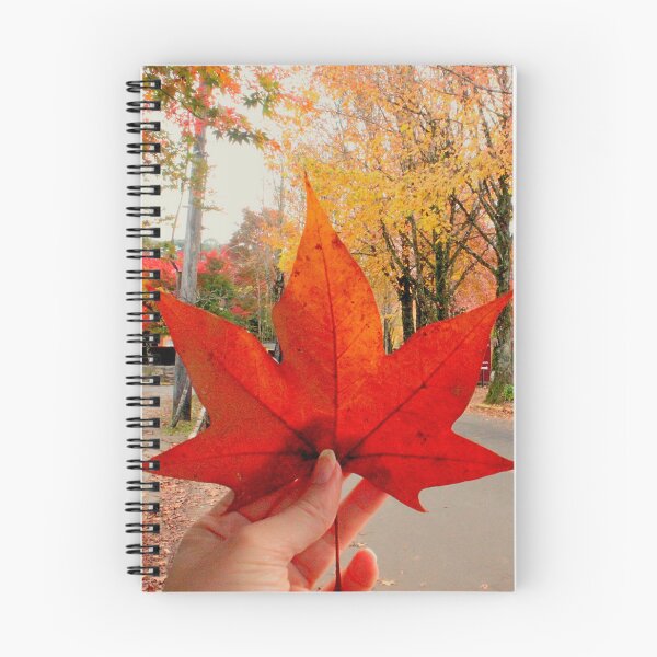 Item preview, Autumn Magic: Holding a Red Maple Leaf. Vibrant Red Autumn Maple Leaf in Hand designed and sold by TaynaraVieira.