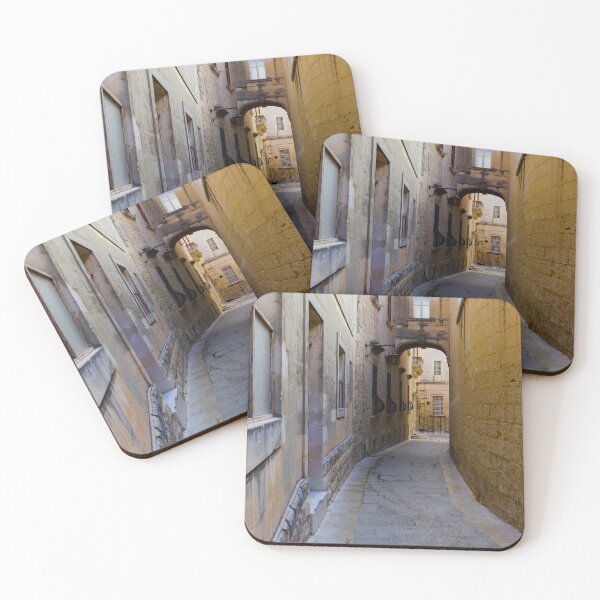 Item preview, Narrow Stone Alleyway Through Historic Mediterranean Town With Arch, Windows and Soft Light designed and sold by Nmallia.