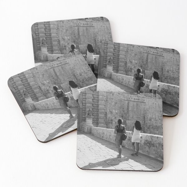 Item preview, Two Women Walking Along Historic Stone Ramparts by Ancient Arch in Mediterranean Old Town designed and sold by Nmallia.