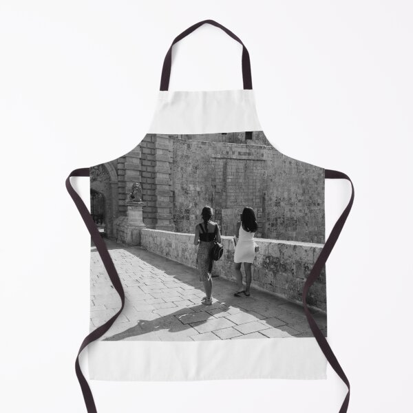 Item preview, Two Women Walking Along Historic Stone Ramparts by Ancient Arch in Mediterranean Old Town designed and sold by Nmallia.