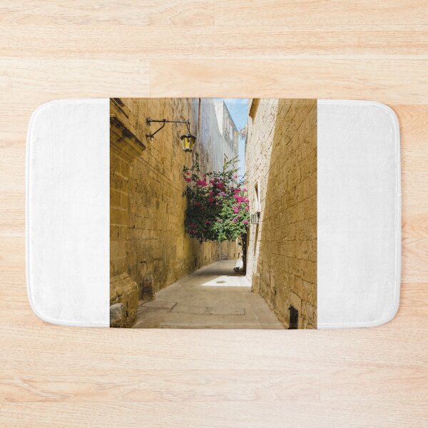 Item preview, Sunlit Narrow Stone Alley With Bougainvillea And Lantern In Historic Mediterranean Old Town designed and sold by Nmallia.