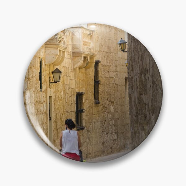 Item preview, Woman Pushing Stroller Through Narrow Historic Stone Alley in Old Town on Sunny Day designed and sold by Nmallia.