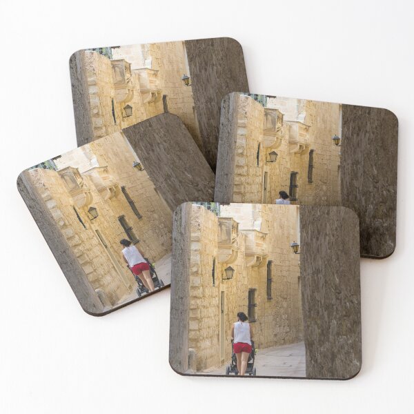 Item preview, Woman Pushing Stroller Through Narrow Historic Stone Alley in Old Town on Sunny Day designed and sold by Nmallia.