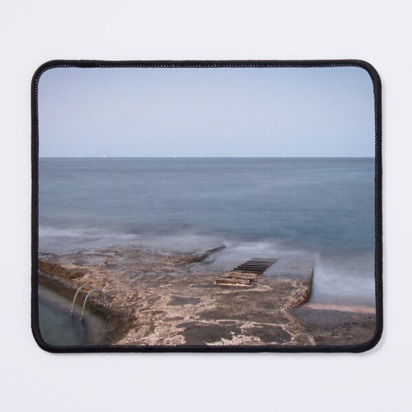 Item preview, Calm Rocky Coastline With Concrete Pier and Metal Ladder Overlooking Misty Sea at Twilight designed and sold by Nmallia.