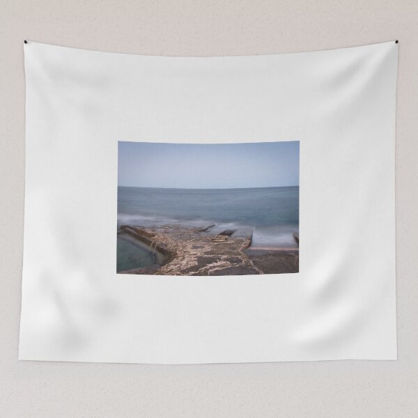 Item preview, Calm Rocky Coastline With Concrete Pier and Metal Ladder Overlooking Misty Sea at Twilight designed and sold by Nmallia.