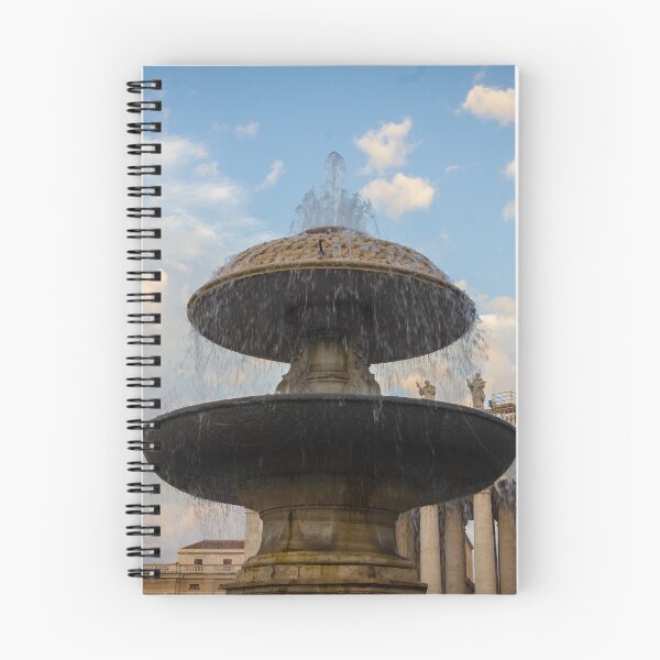Item preview, Historic Fountain at St. Peter's Square With Colonnade Statues Under a Blue Sky designed and sold by Nmallia.