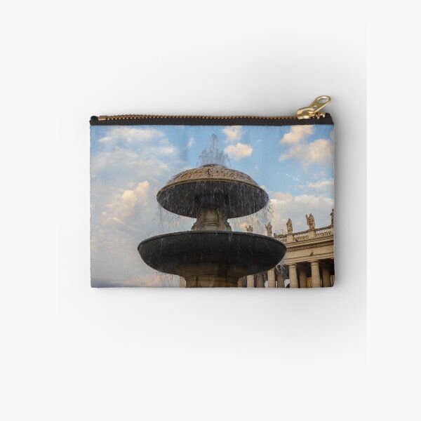 Item preview, Historic Fountain at St. Peter's Square With Colonnade Statues Under a Blue Sky designed and sold by Nmallia.