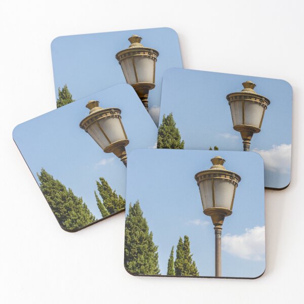 Item preview, Vintage Street Lamp Post Against Clear Blue Sky With Cypress Trees in Sunny Park designed and sold by Nmallia.